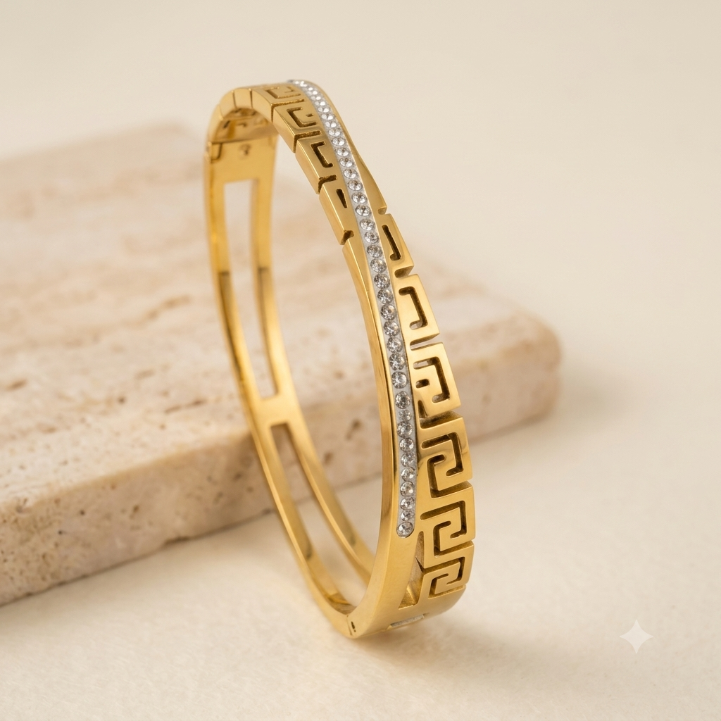 Gold bracelet with greek pattern and cross stones line