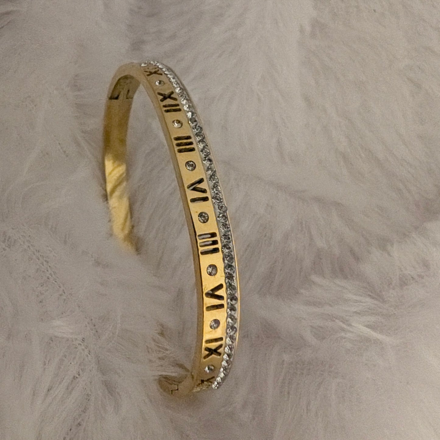 Gold bracelet with Roman numeral design and studded white stones 18k gold plated