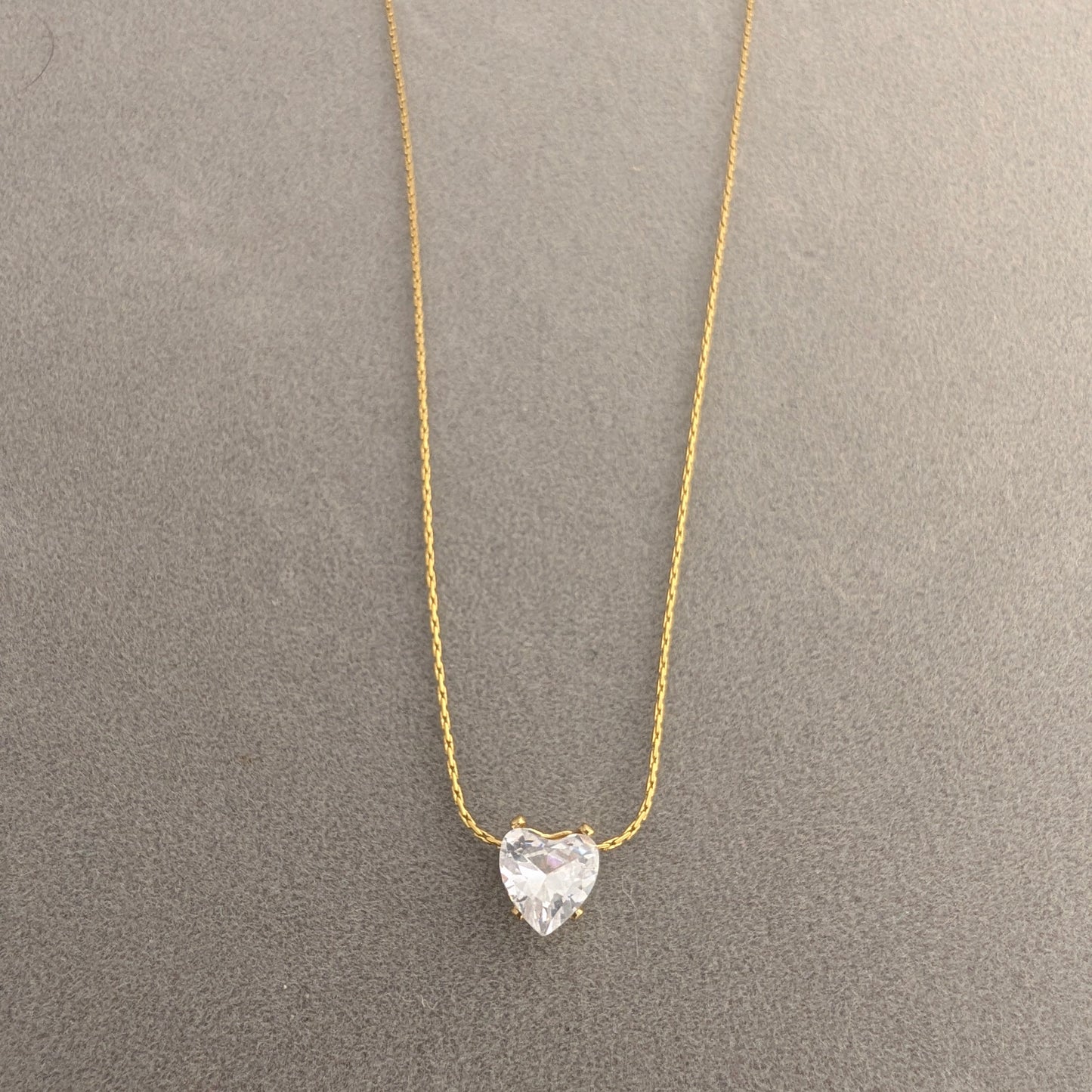 Heart-shaped diamond pendant