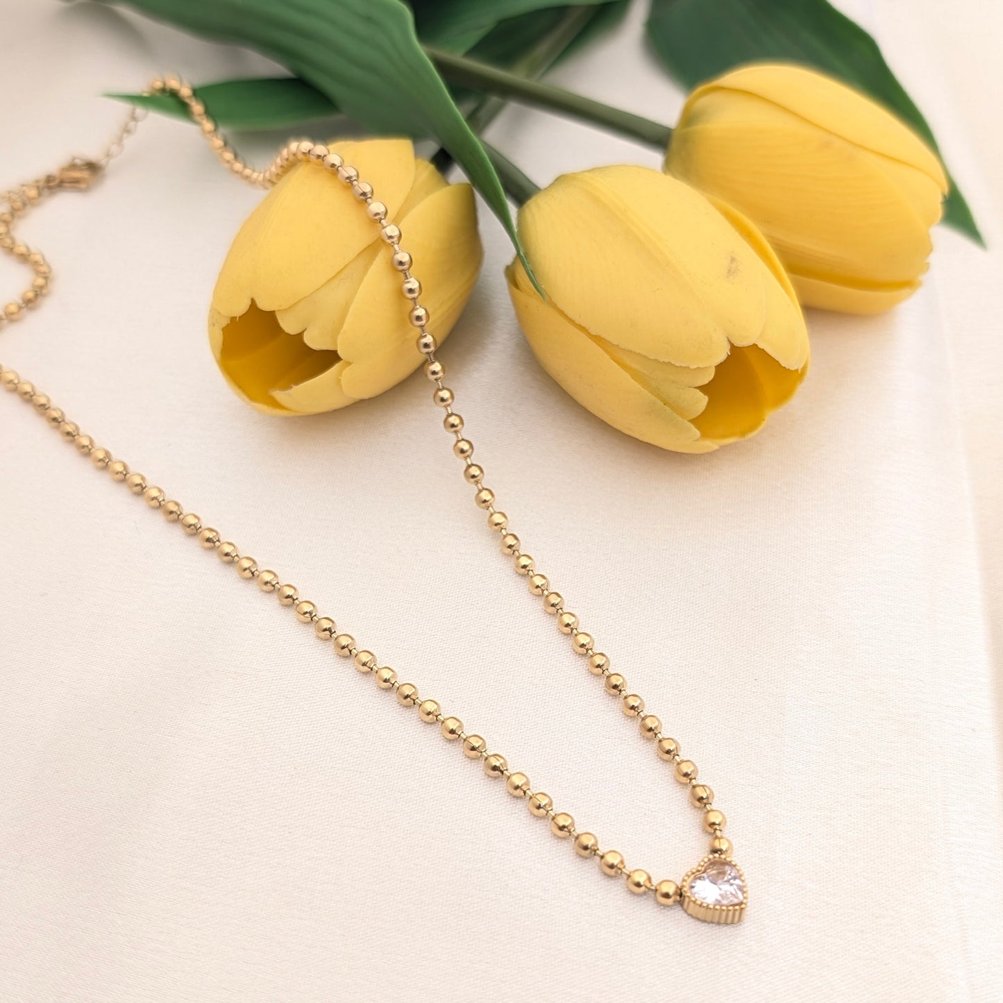 Gold bead heart pendant chain