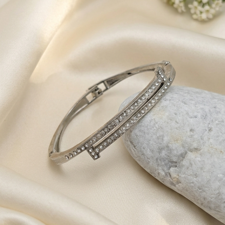 silver-toned open bangle kada