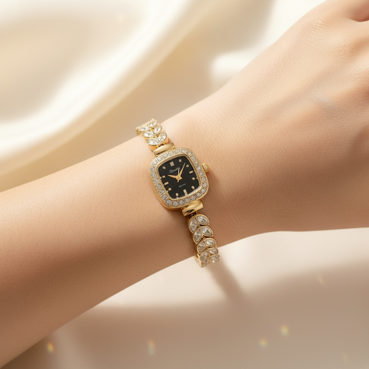  Gold-tone watch with a black dial and diamond-encrusted