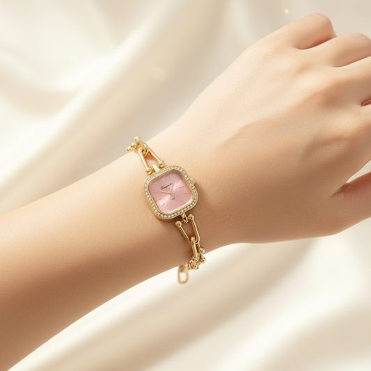  Gold-tone women watch with a square pink gemstone