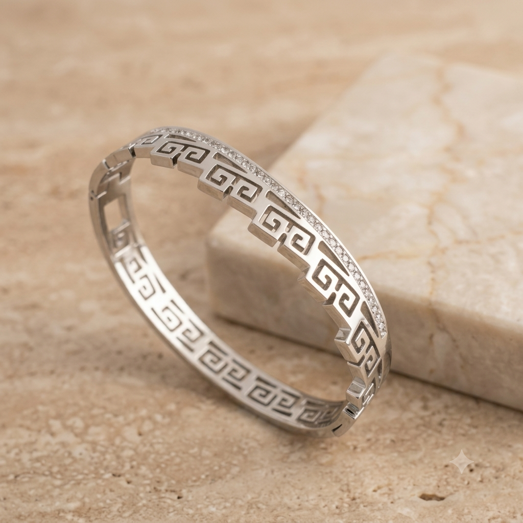 Silver bracelet with Greek key design and studded white stones
