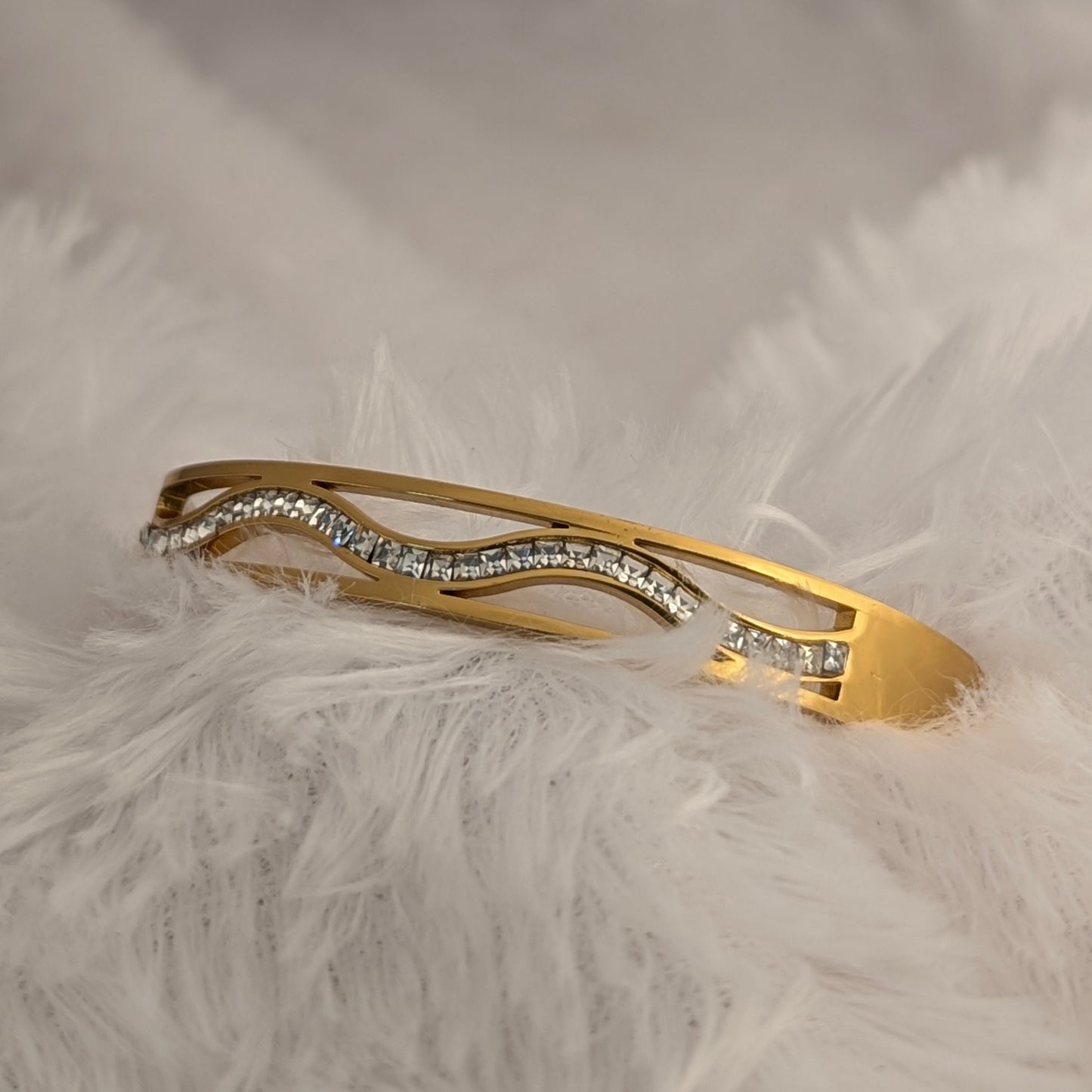 Gold bracelet with rhinestones Wave Shaped