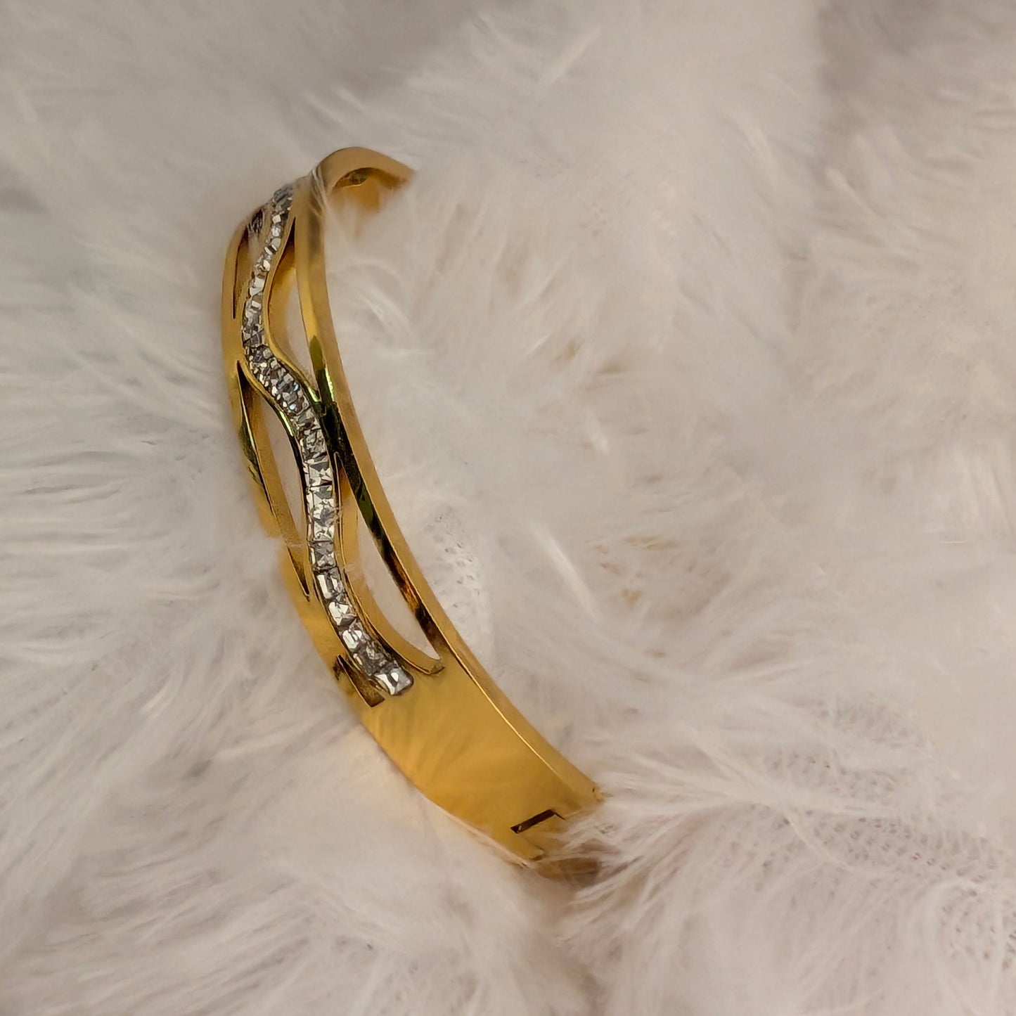 Gold bracelet with rhinestones Wave Shaped