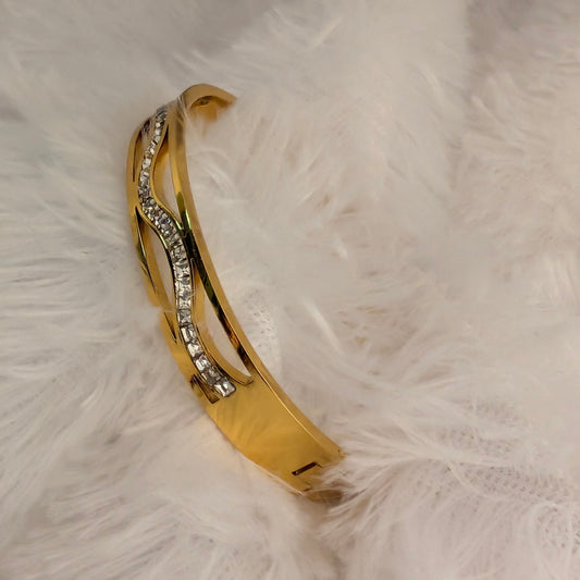 Gold bracelet with rhinestones Wave Shaped