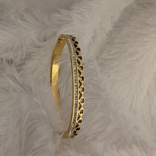 Gold bracelet with intricate design and studded white stones 18k gold plated antitarnish