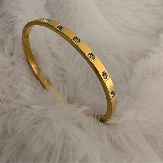 Gold bracelet with Embedded Medium Stones