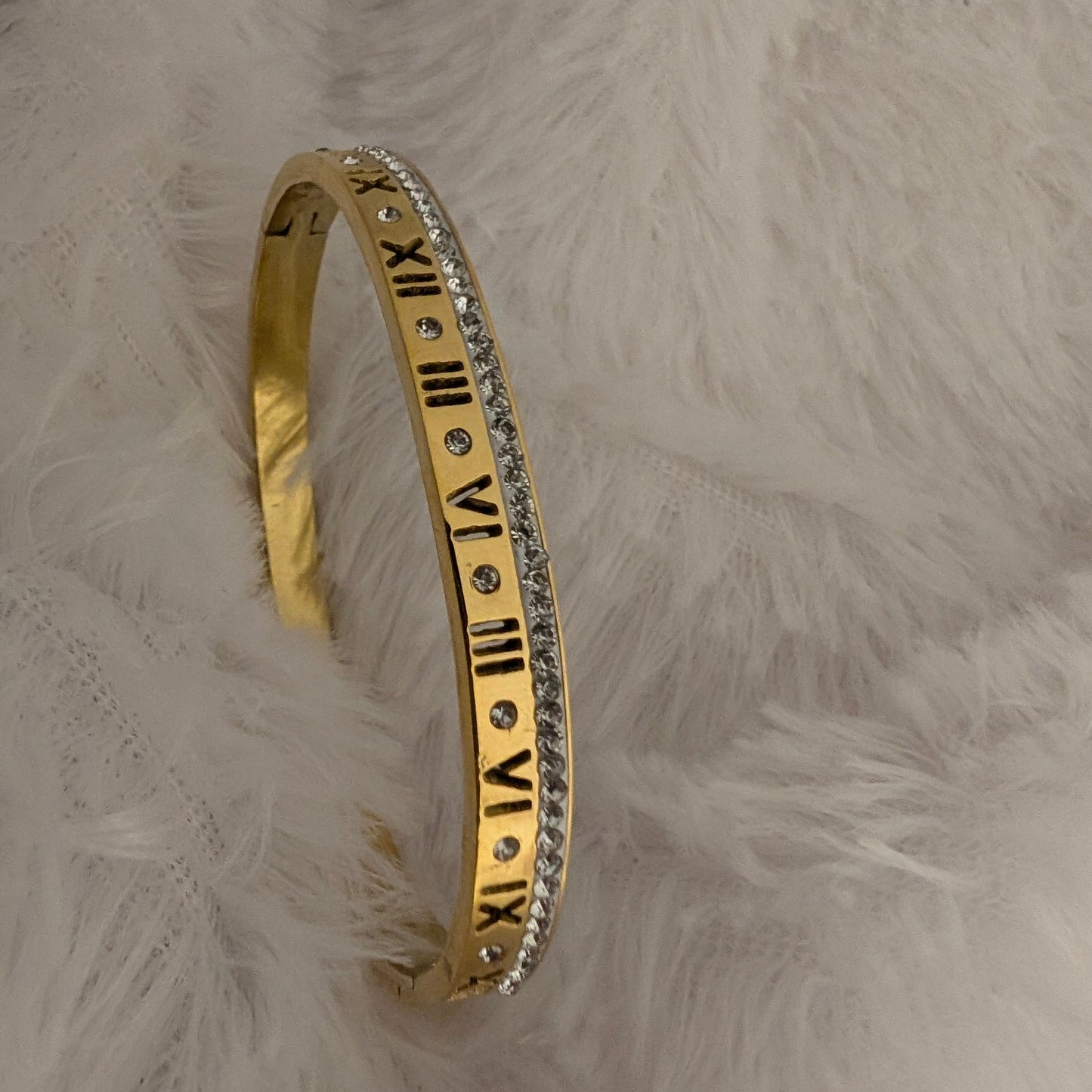 Gold bracelet with Roman numeral design and studded white stones 18k gold plated