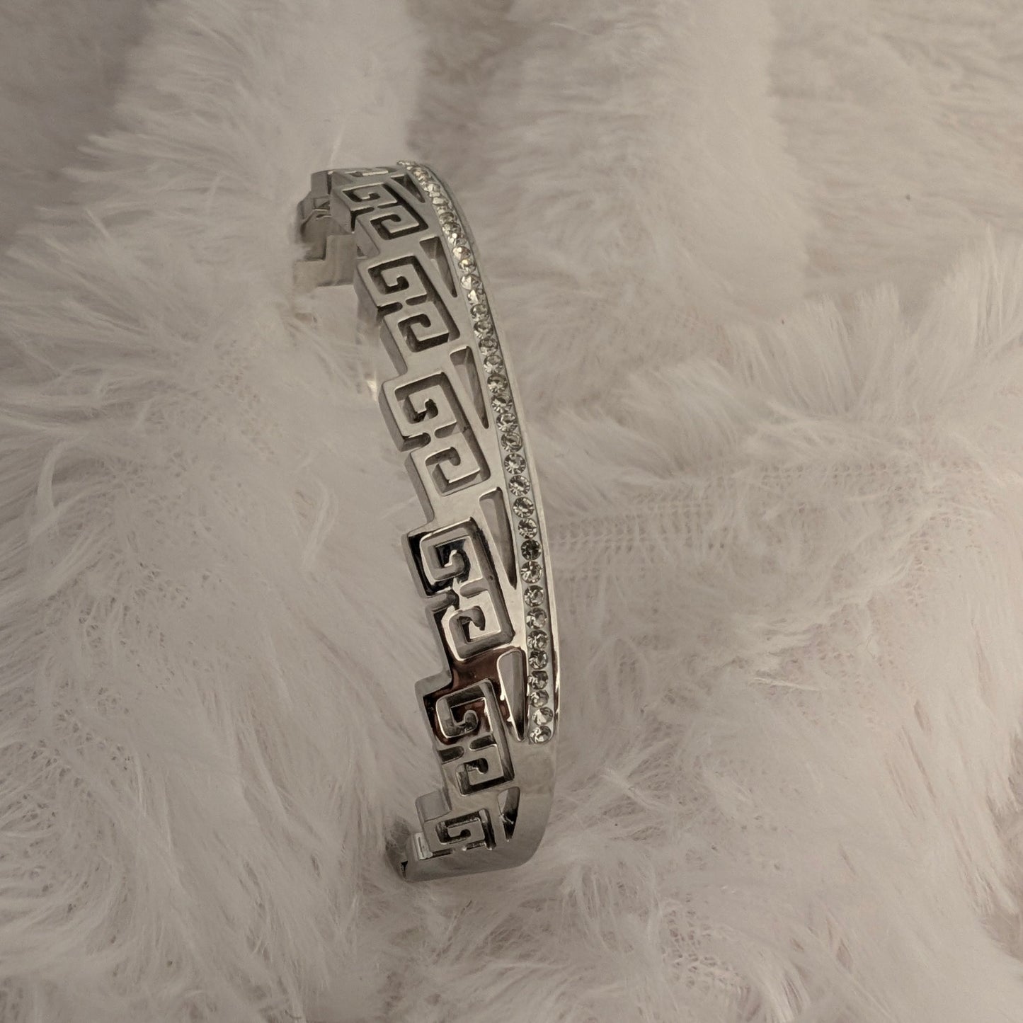 Silver bracelet with Greek key design and studded white stones
