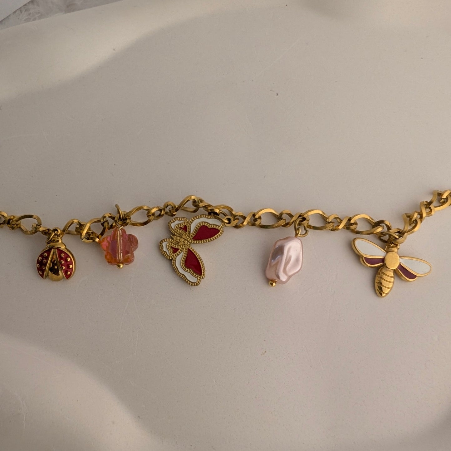 Butterfly bloom charm bracelet