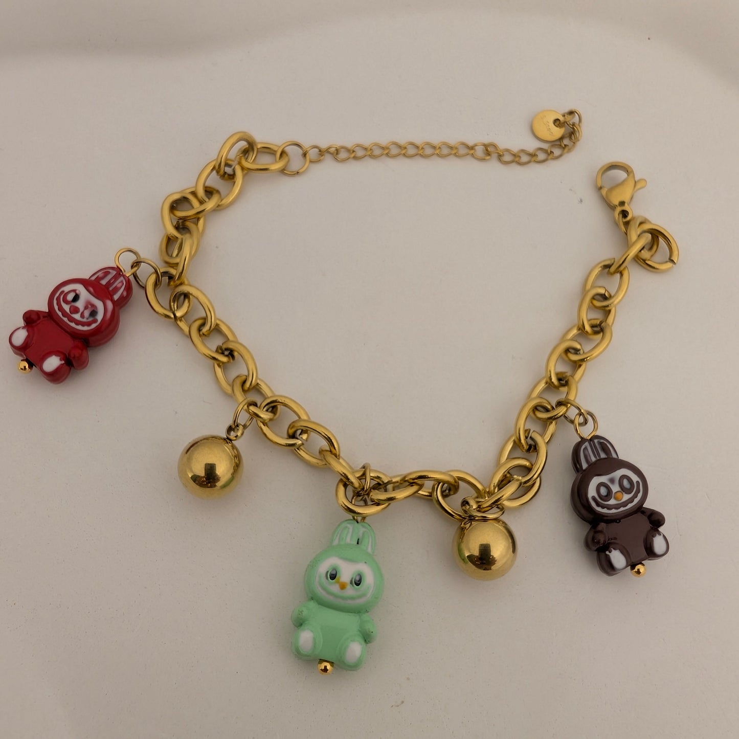 Gold chain bracelet with colorful labubi doll charms