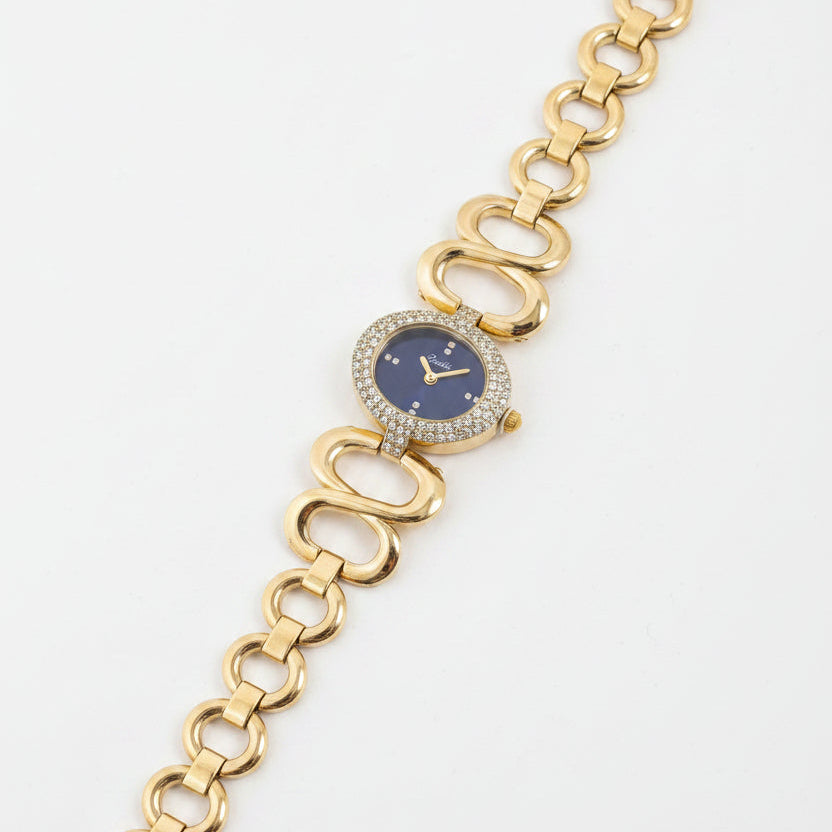 Gold-tone chain watch with a blue dial 