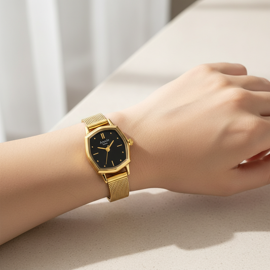 Gold-toned annie london black dial mesh strap watch
