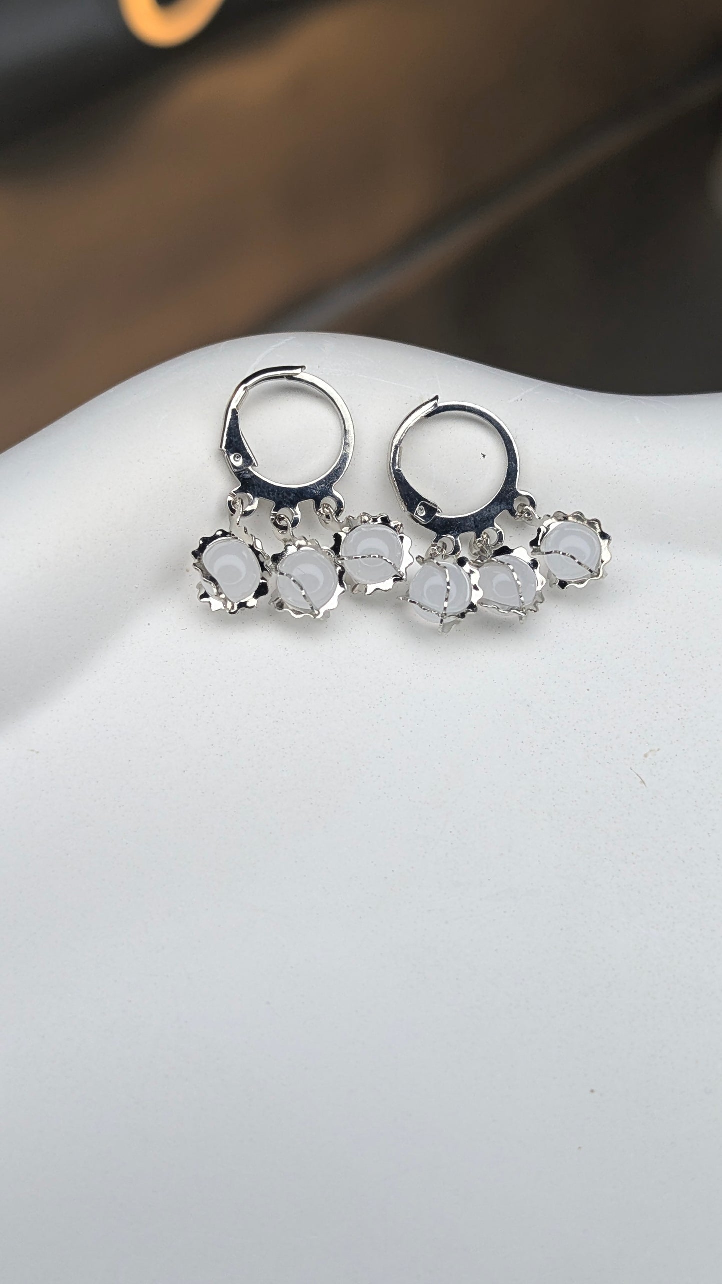 Mini hoop earrings with pearl charms