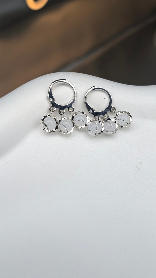 Mini hoop earrings with pearl charms