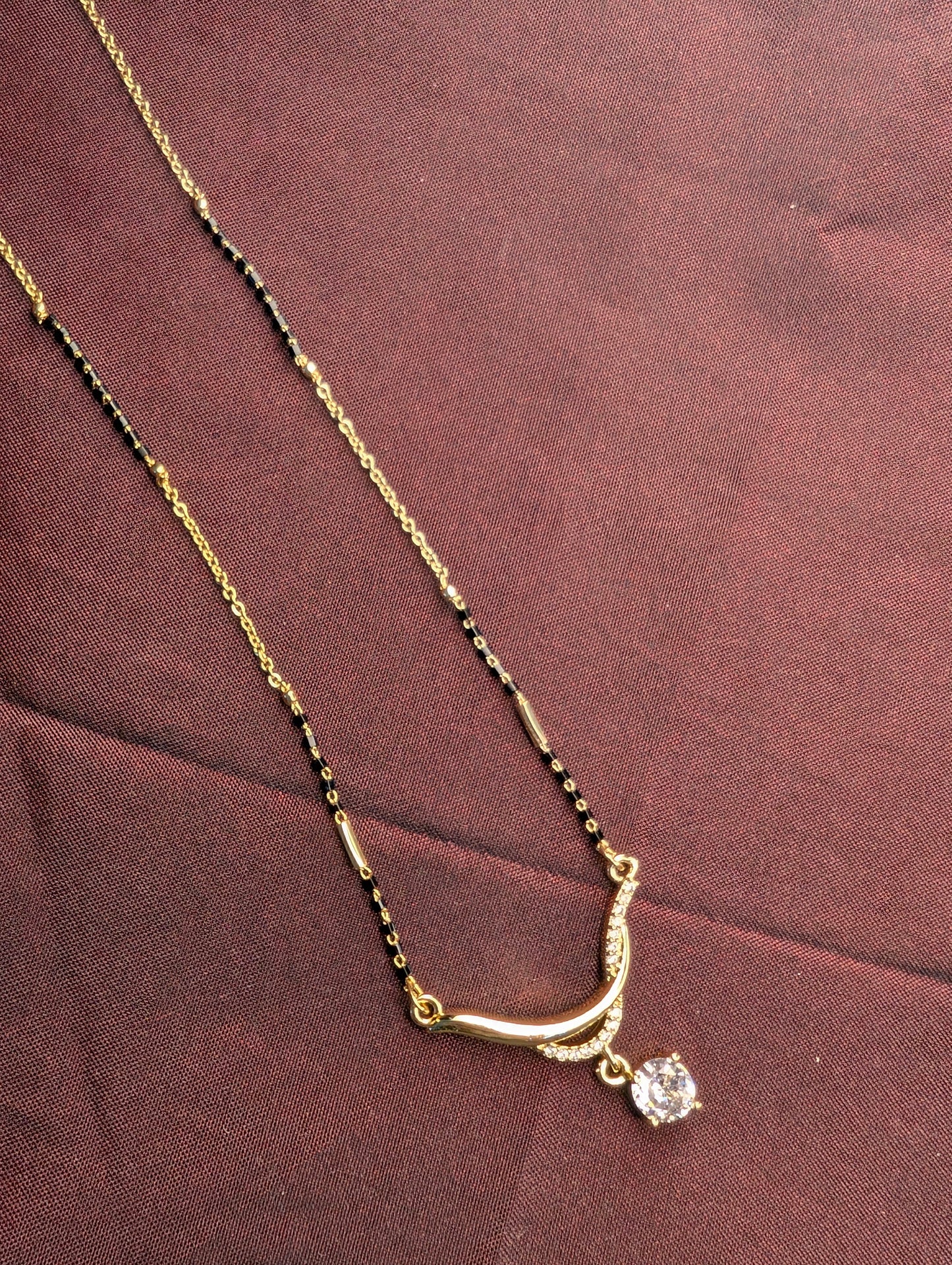 Antitarnish mangalsutra with solitaire drop pendant.
