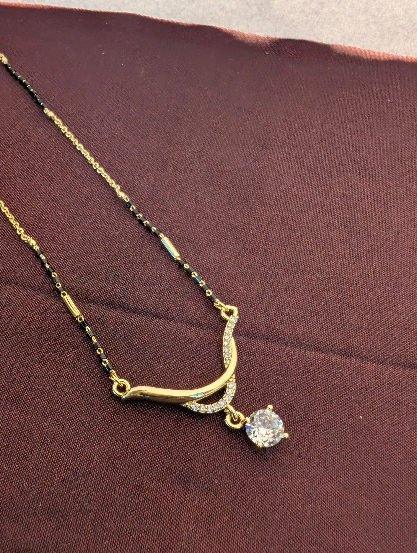 Antitarnish mangalsutra with solitaire drop pendant.