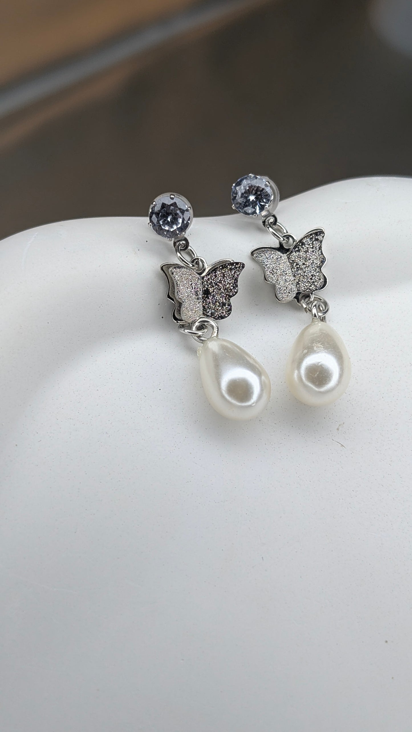 Crystal butterfly pearl dangle earrings