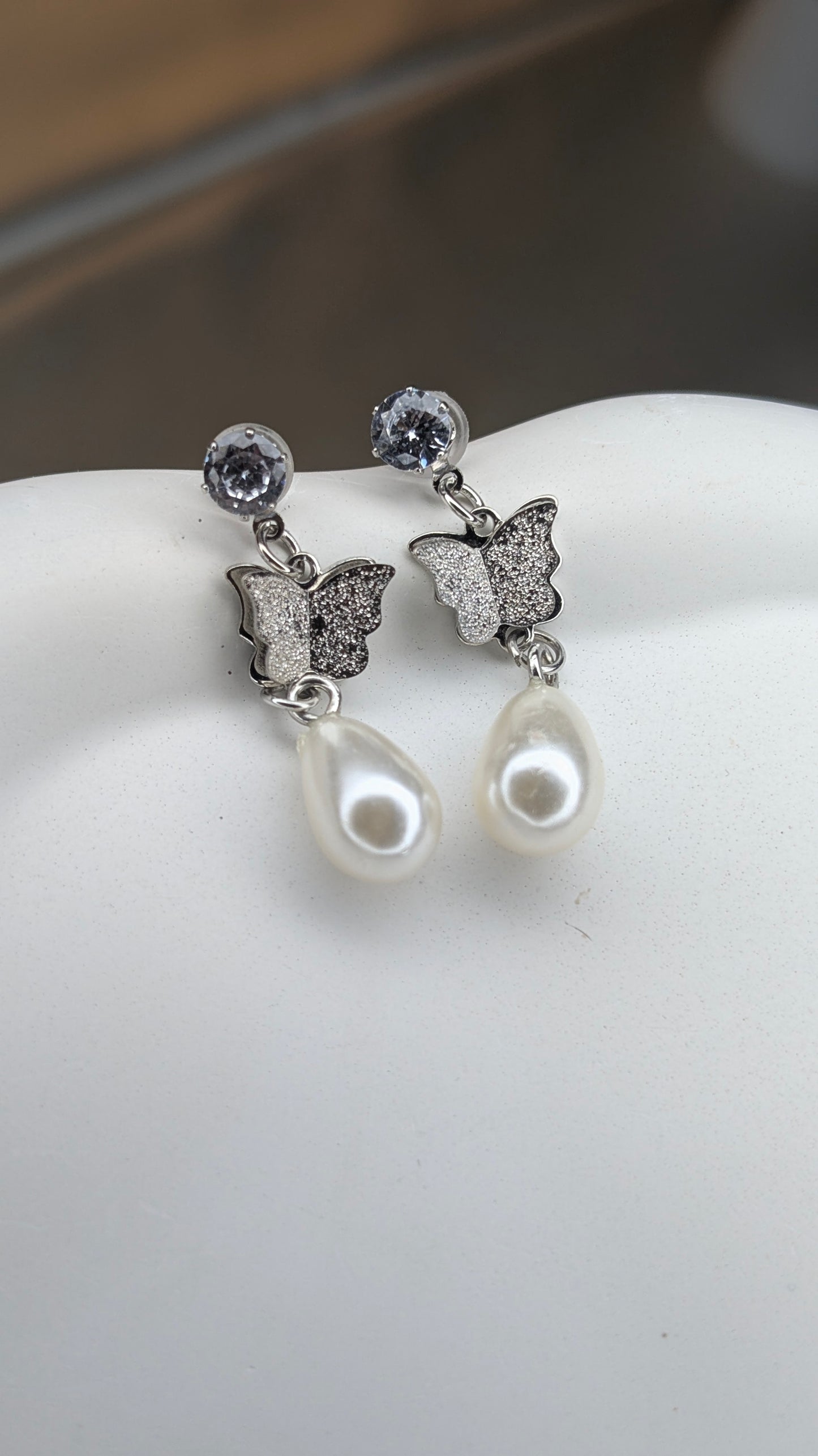 Crystal butterfly pearl dangle earrings